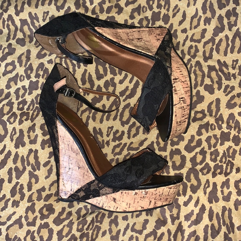 Woman’s Black Lace Wedges
